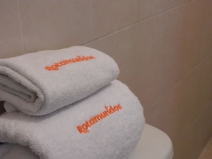 Shower, free toiletries, towels, soap