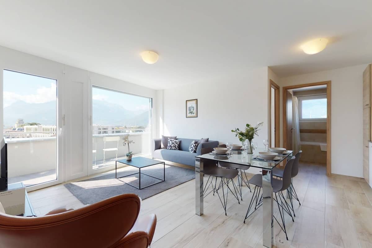 Basic Apartment, 1 Queen Bed | Living area | TV