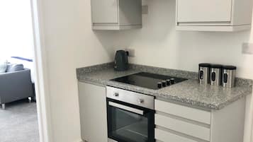 Apartemen Deluks, ensuite | Dapur bersama