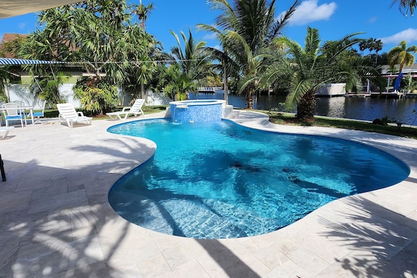 Heated Tropical Pool: 4 lounge chairs, Dining table with chairs and Coffee area