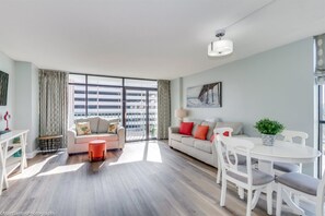 Condo, 2 Bedrooms, Balcony, Partial Ocean View (2651) | Living room | TV, DVD player - Sand Dunes Resort By Escape (Myrtle Beach)