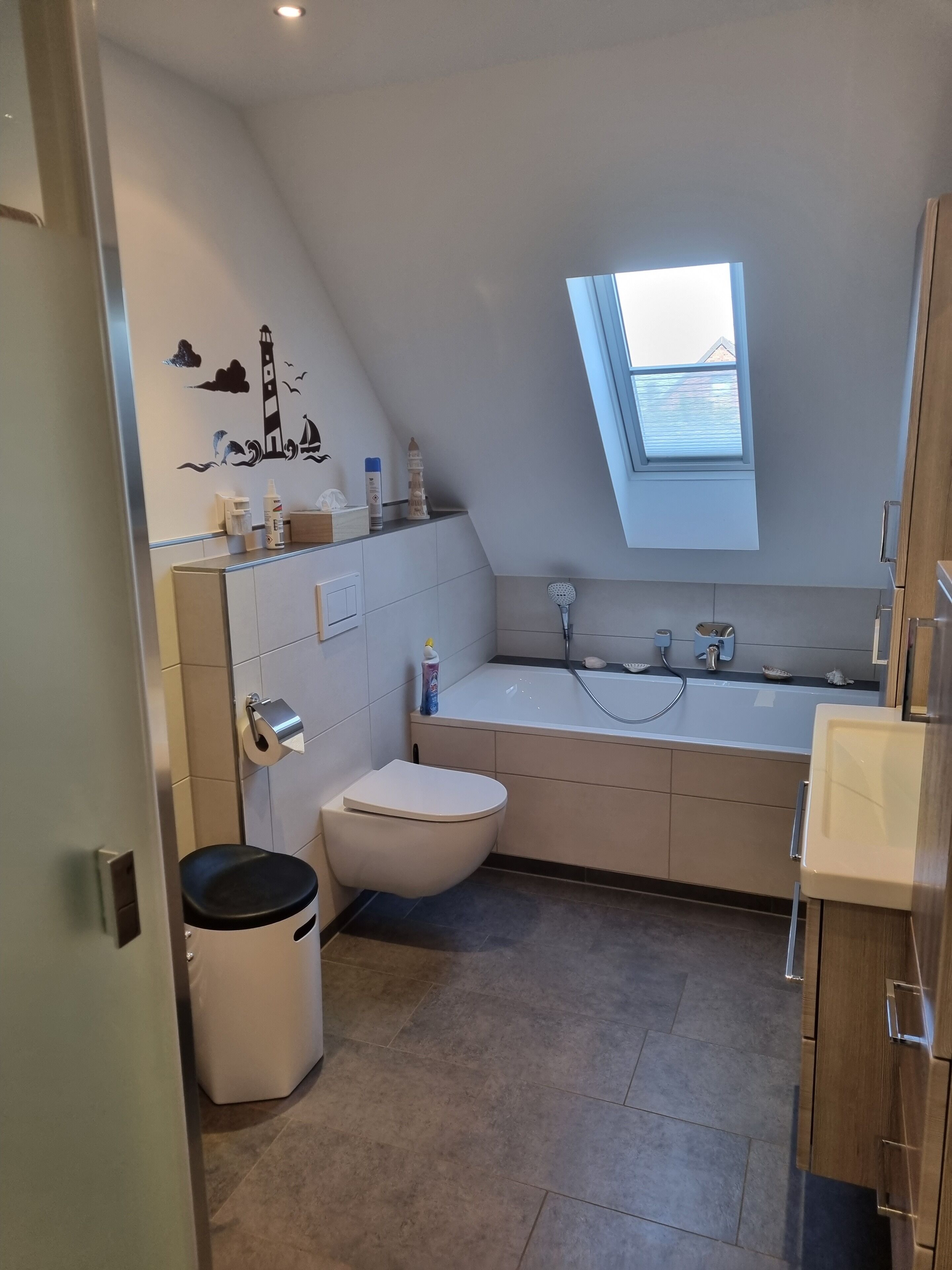 Bathtub, hair dryer, towels, soap