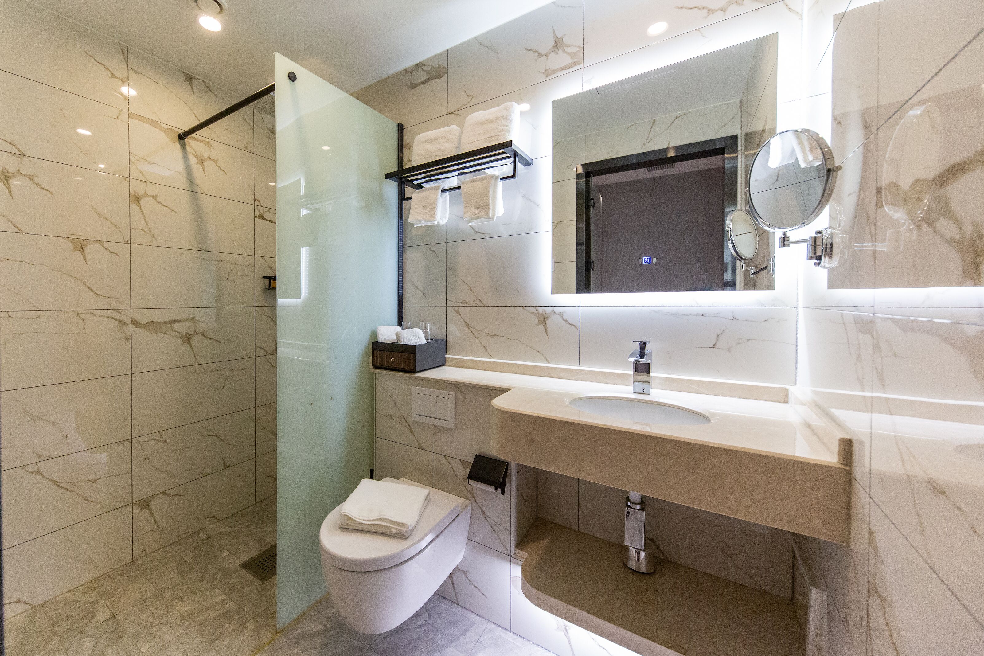 shower, hair dryer, heated floors, towels