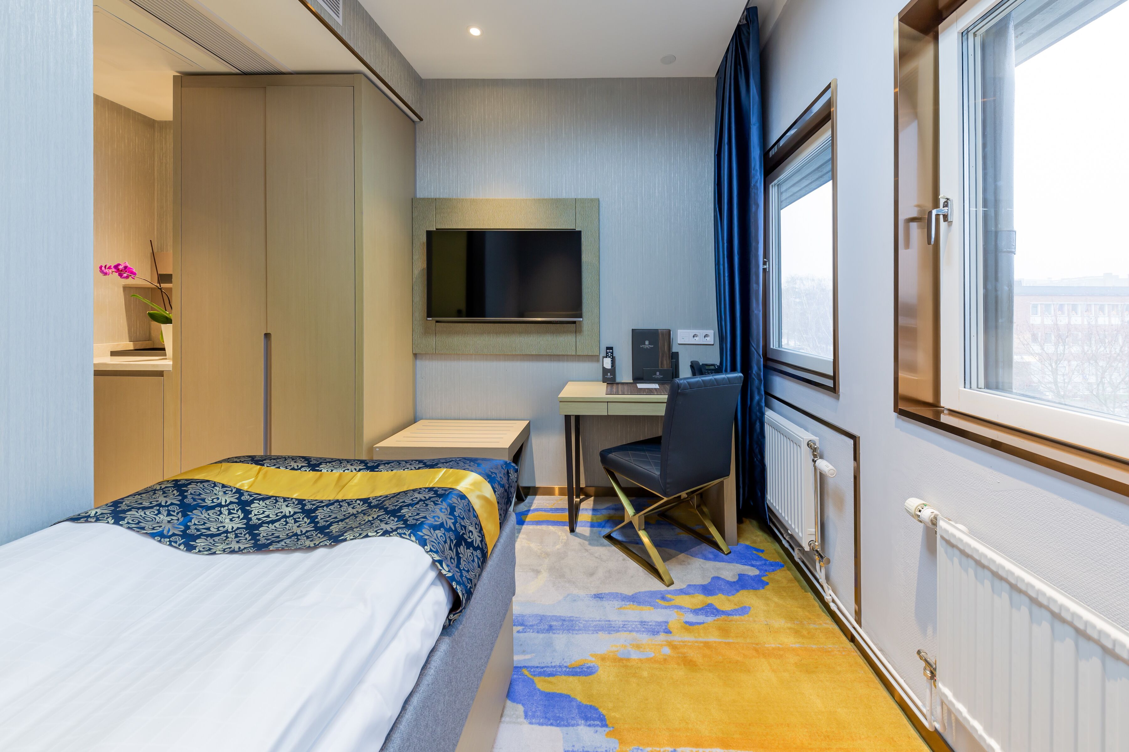 standard single room | 1 bedroom, in-room safe, desk, blackout curtains