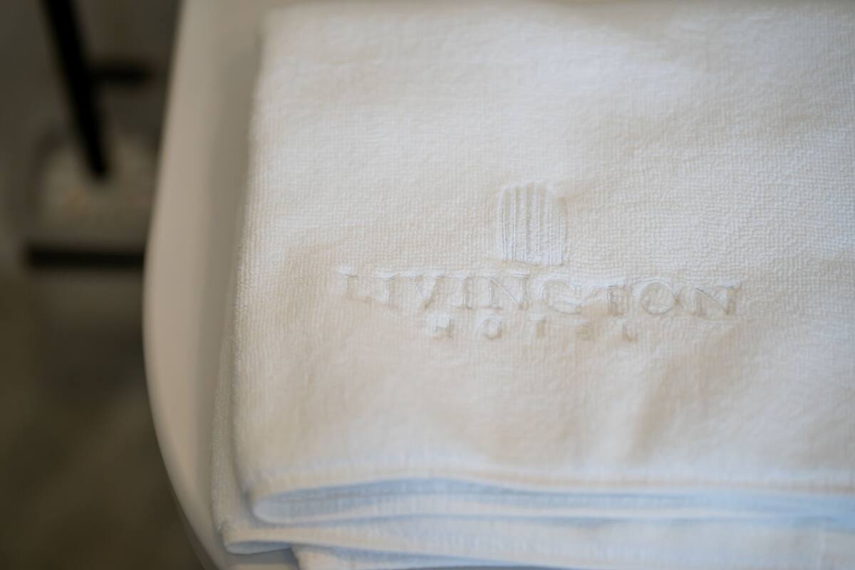 shower, hair dryer, heated floors, towels