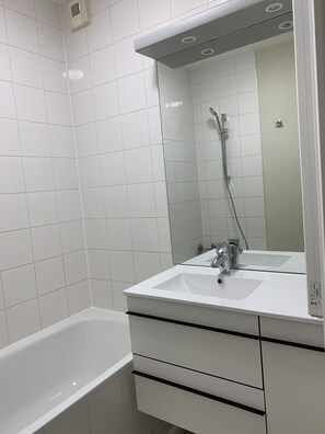 Hair dryer, towels, soap, toilet paper