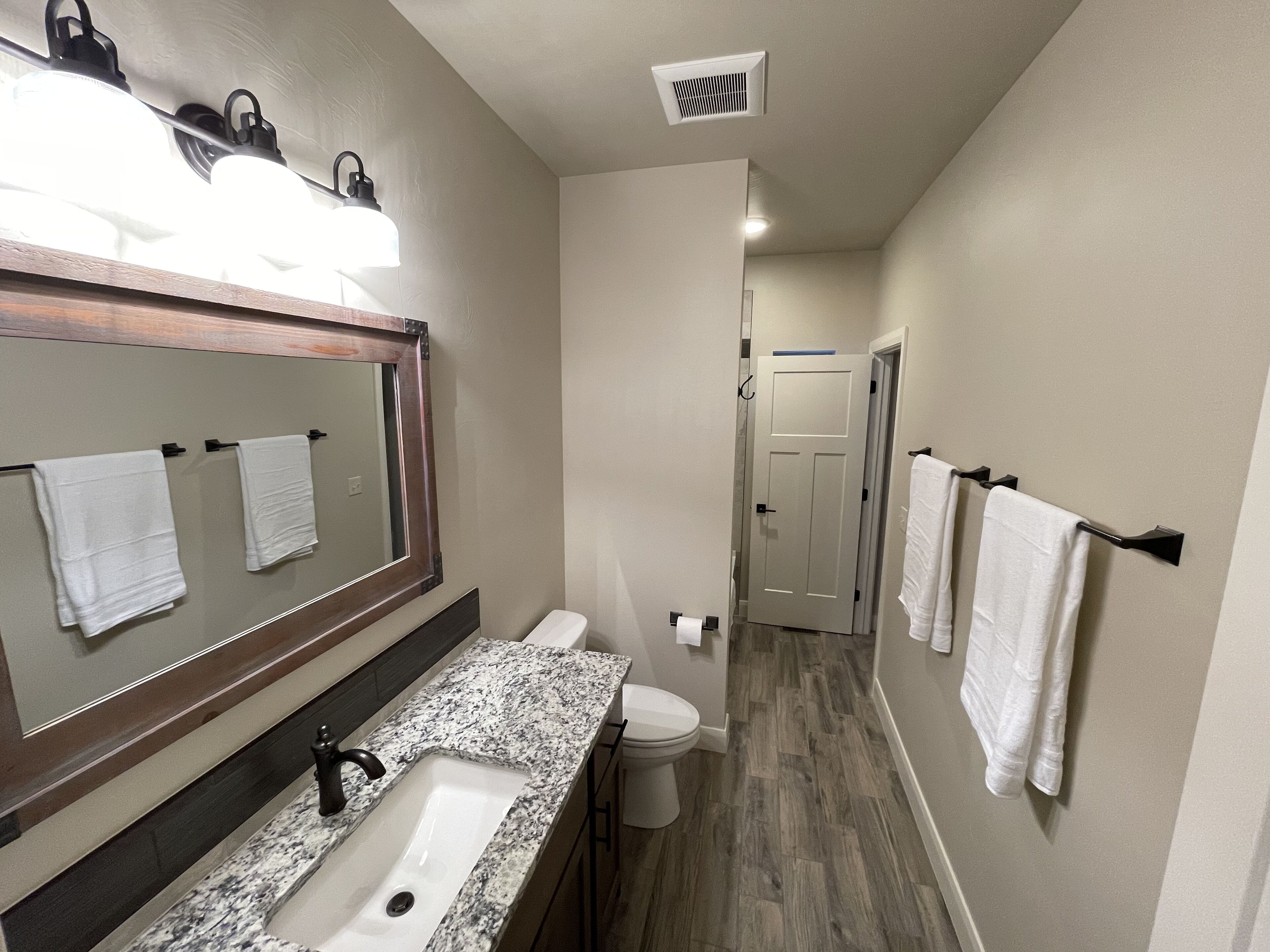 Guest bathroom with private entrance to bedroom 2