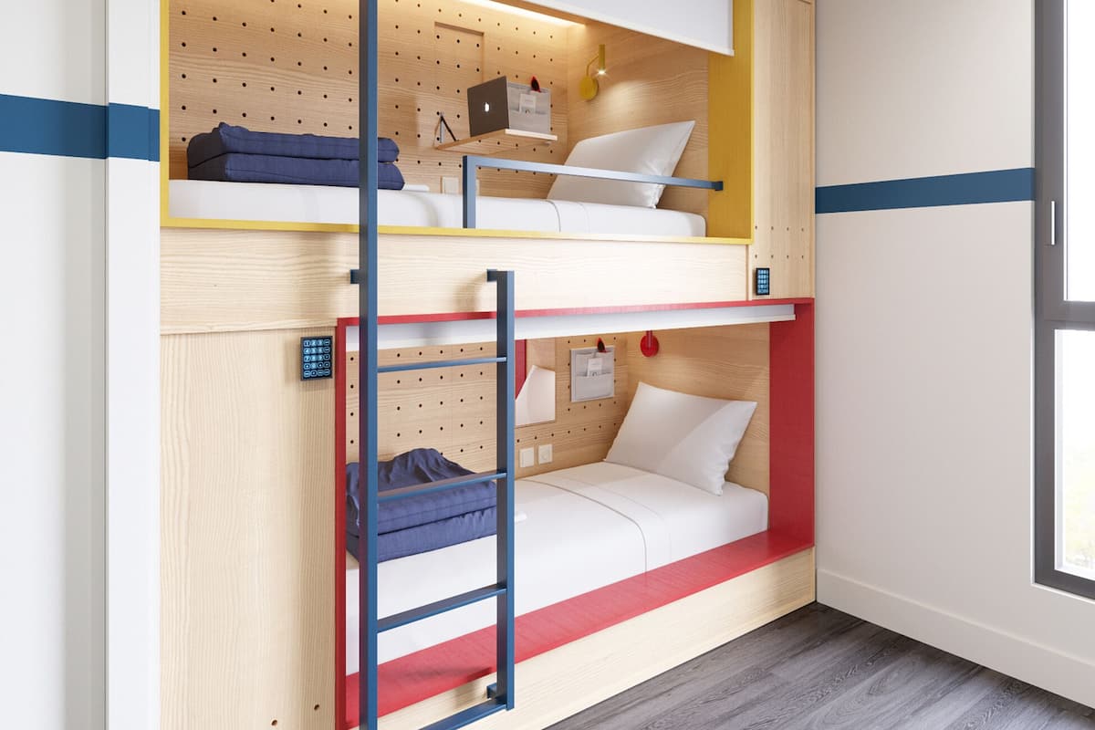1 lit dans une chambre partagée de 5 lits | Phòng cách âm, truy cập Internet không dây miễn phí, bộ trải giường