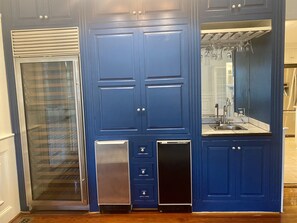 Enjoy a functional kitchen with ample storage, a sink, and a dishwasher.