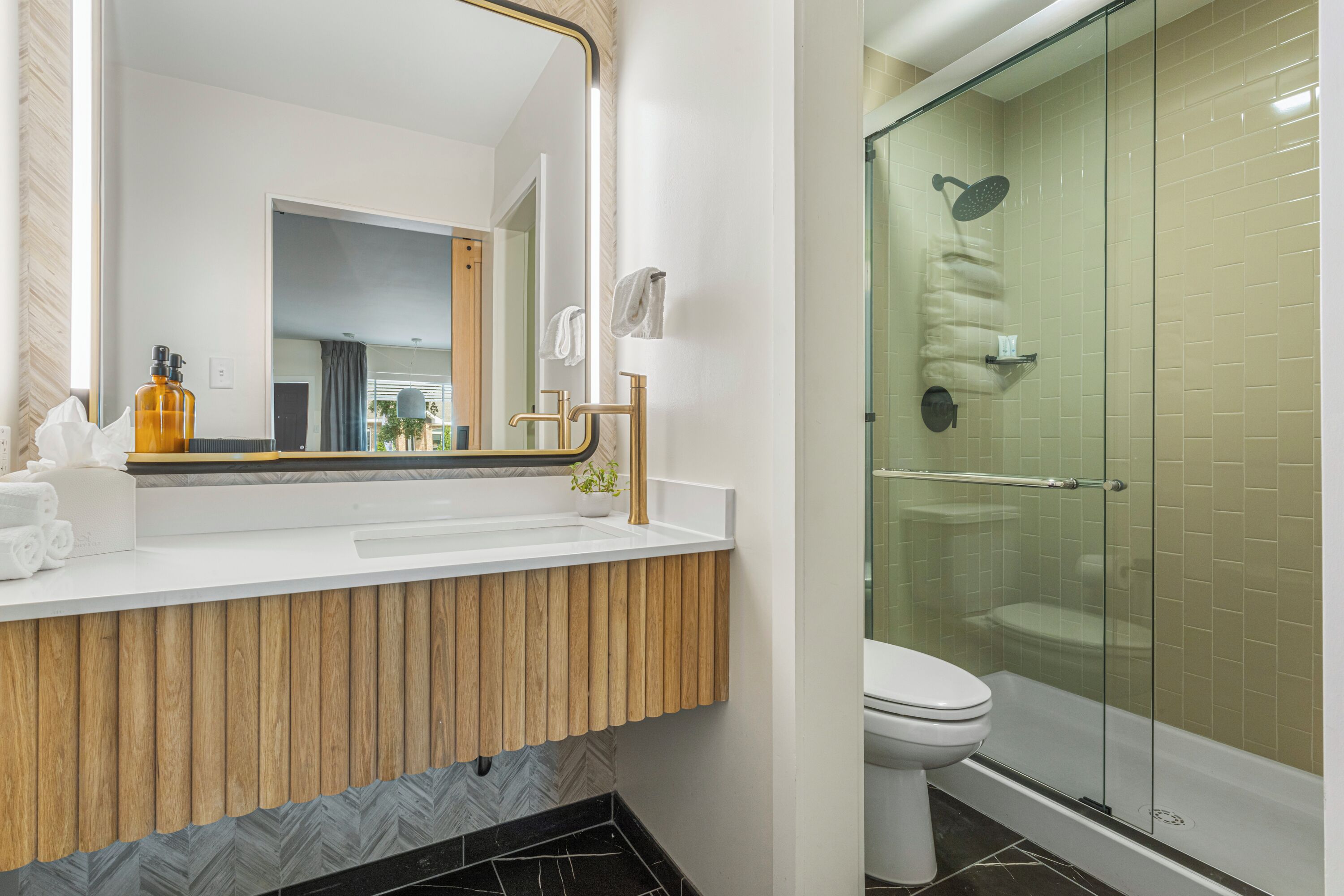 standard king bed | bathroom | free toiletries, hair dryer, towels, soap