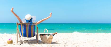 Beach nearby, sun-loungers, beach towels