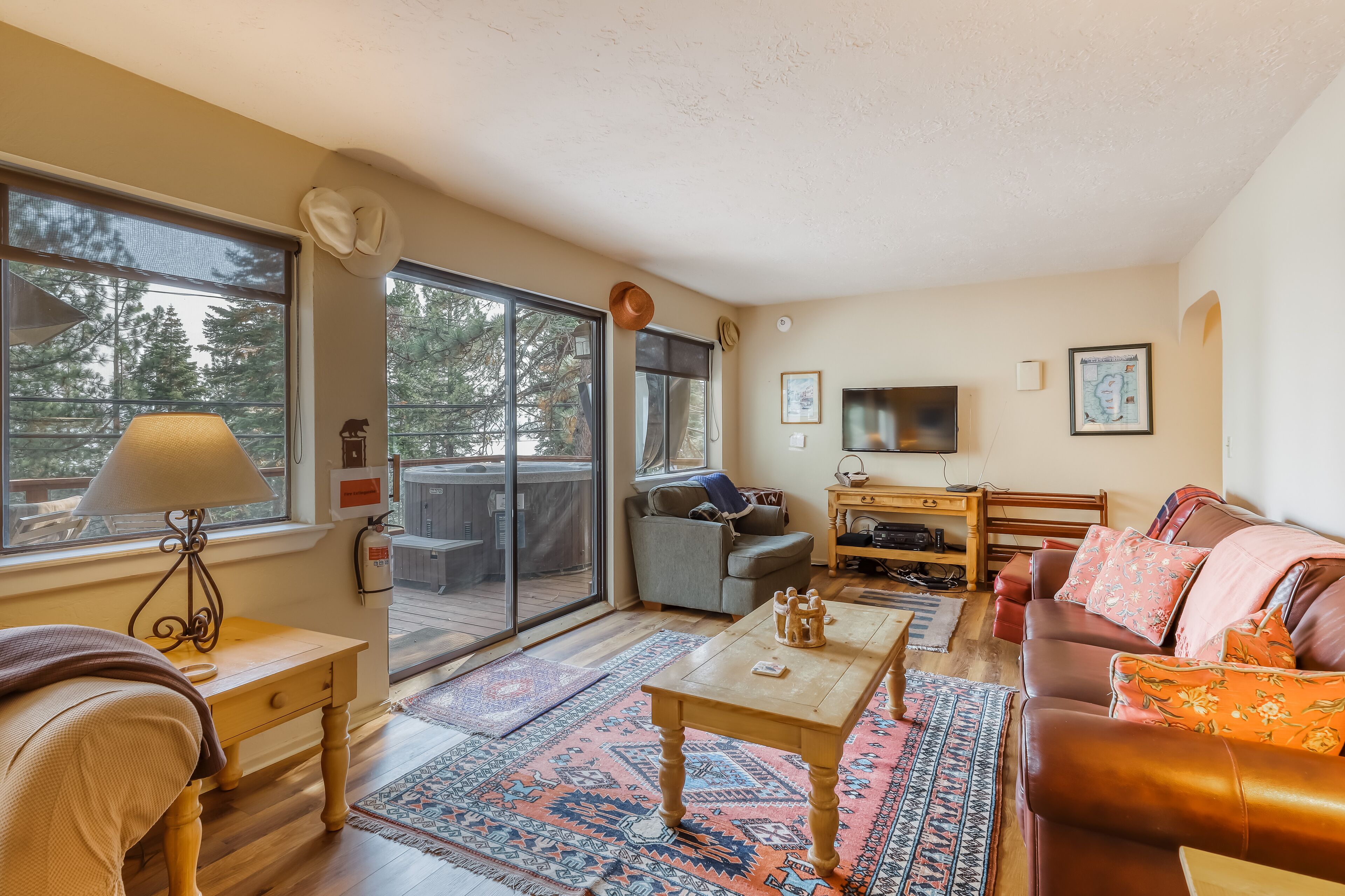 Family-friendly lodge w/ lake views, private hot tub, & spacious interior!