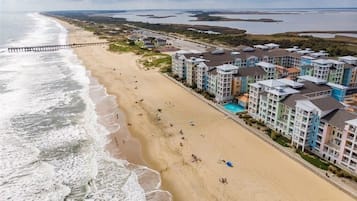 On the beach, sun loungers, beach towels