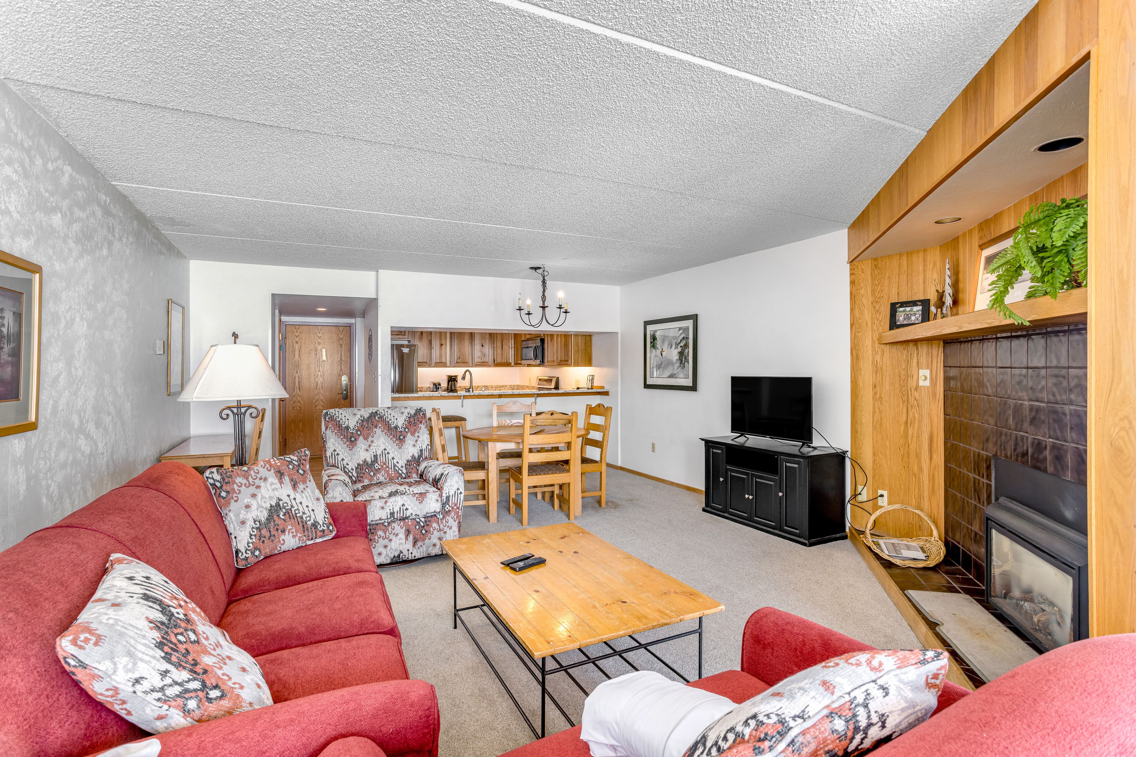 Comfortable condo with ski lift views, shared fitness room, gas fireplace, & W/D