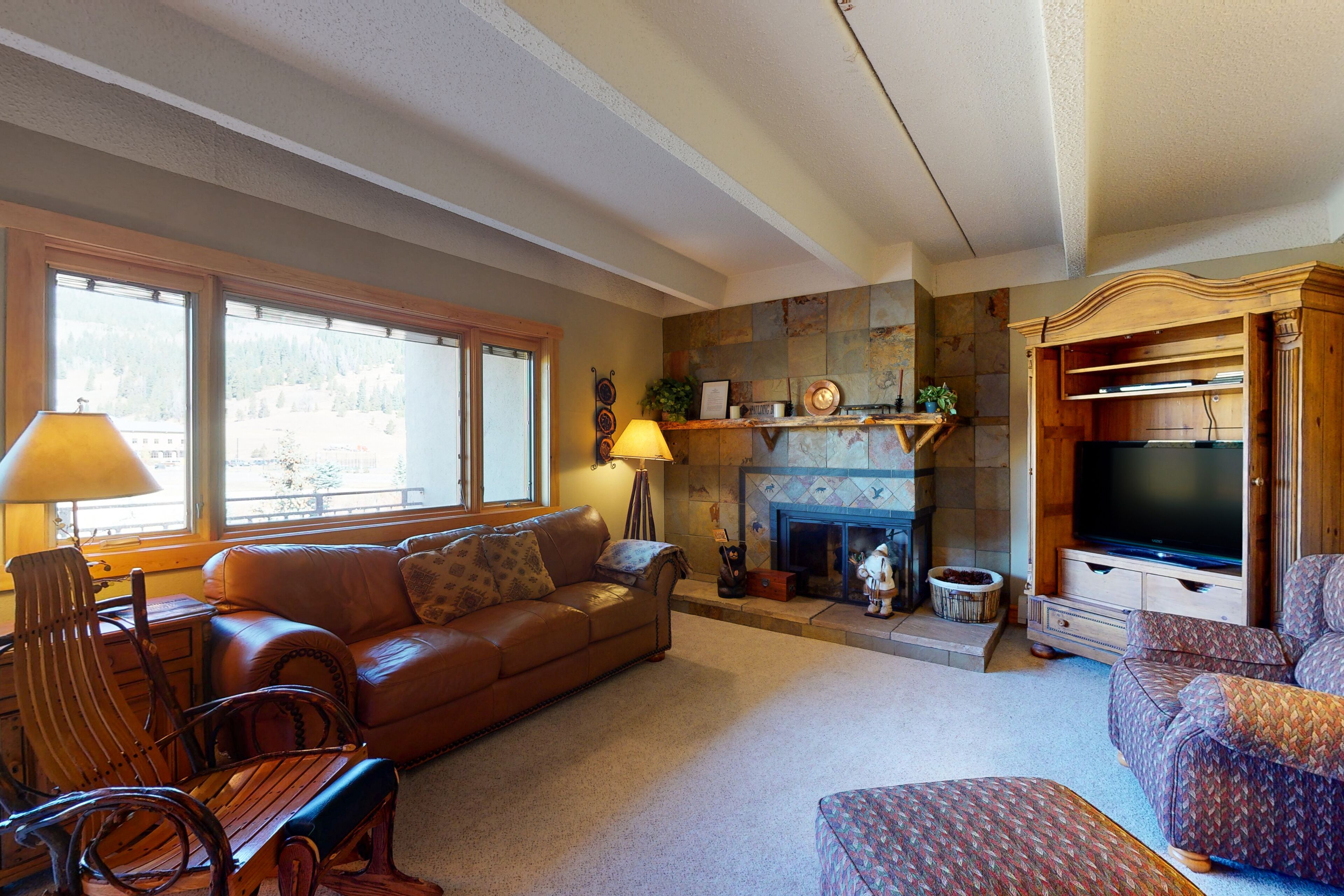 Charming mountain condo w/Vail Pass views, gas fireplace, deck, & shared hot tub