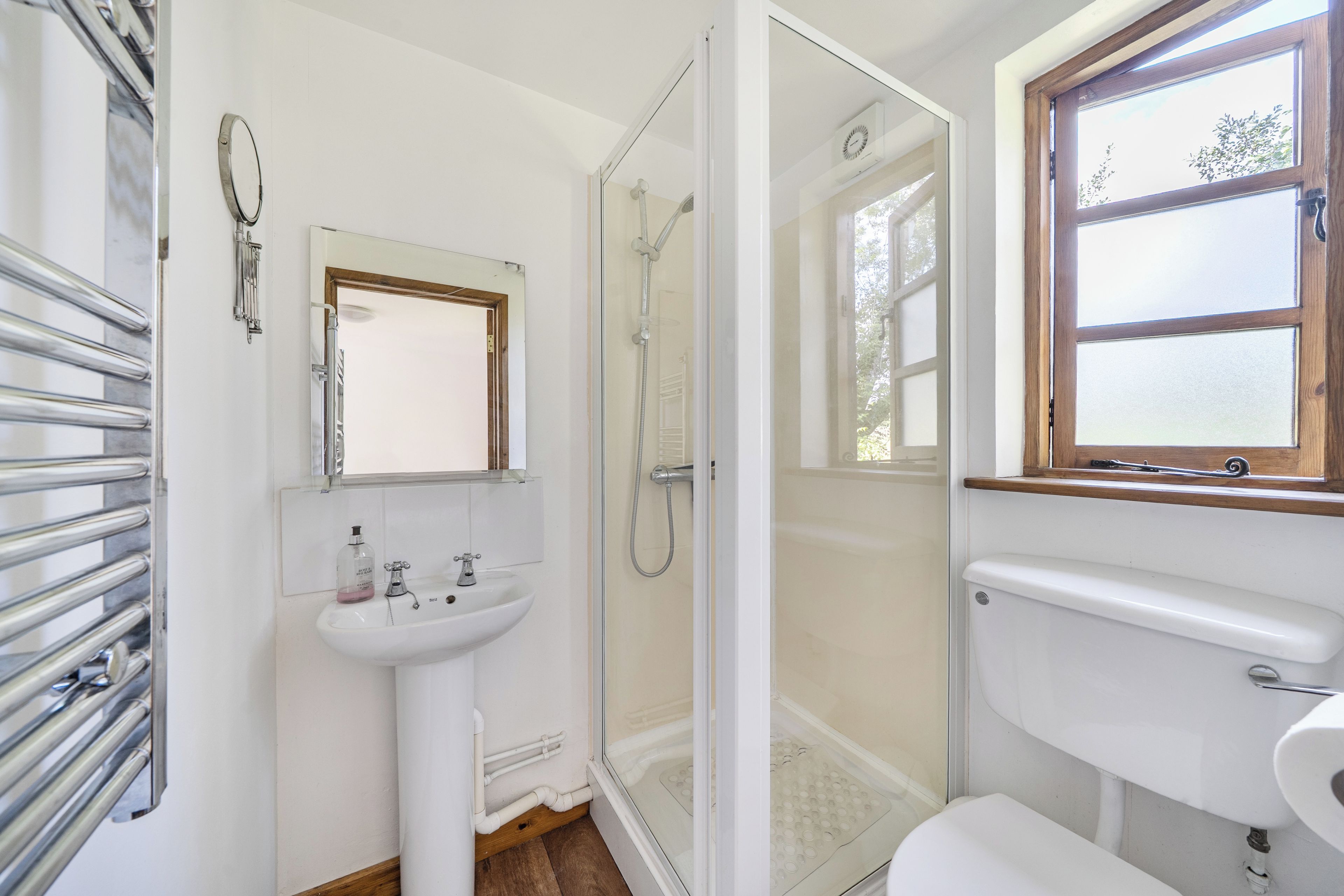 Combined shower/bathtub, deep-soaking bathtub, hair dryer, towels