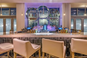 Rooftop bar, pool views, open select days