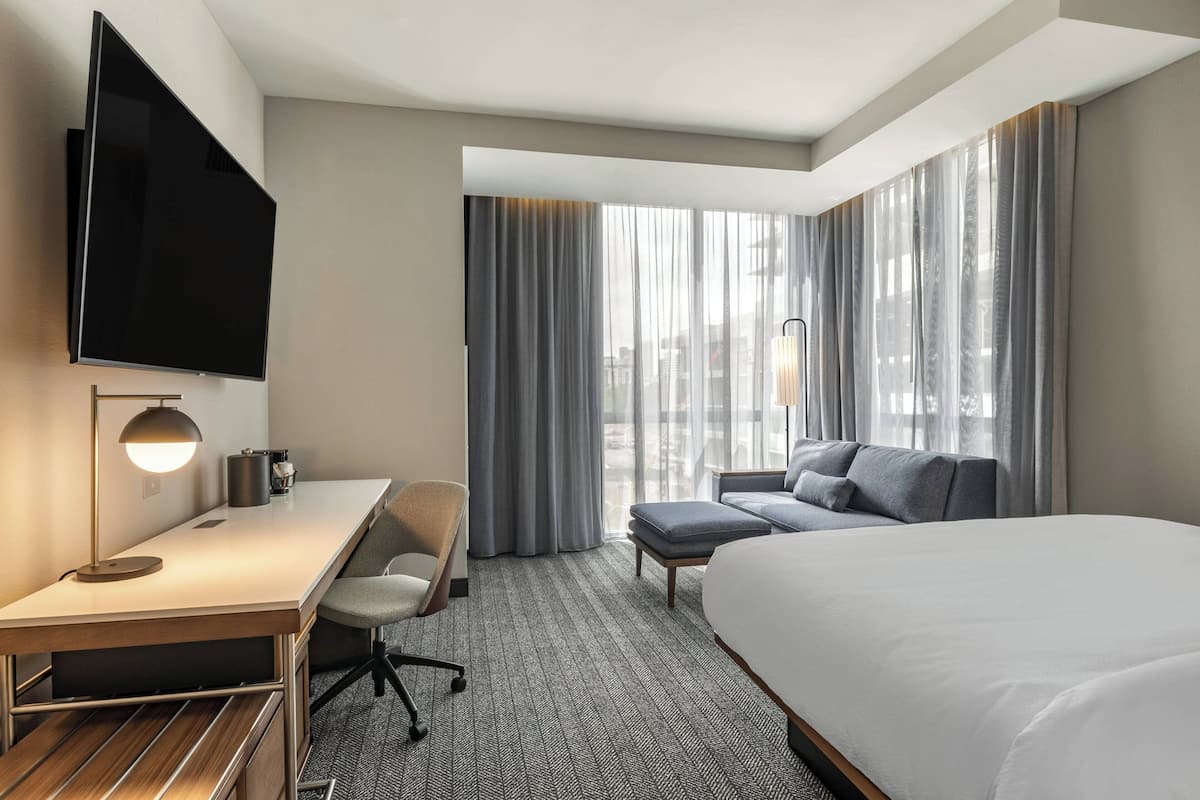 room, 1 king bed with sofa bed, corner | hypo-allergenic bedding, in-room safe, desk, laptop workspace