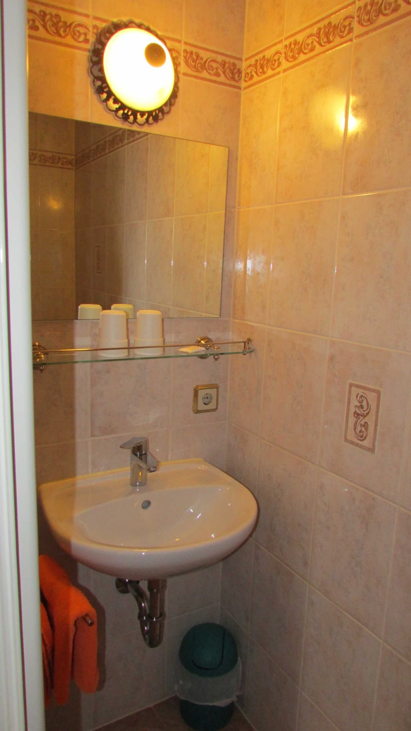 Shower, hair dryer, towels, toilet paper