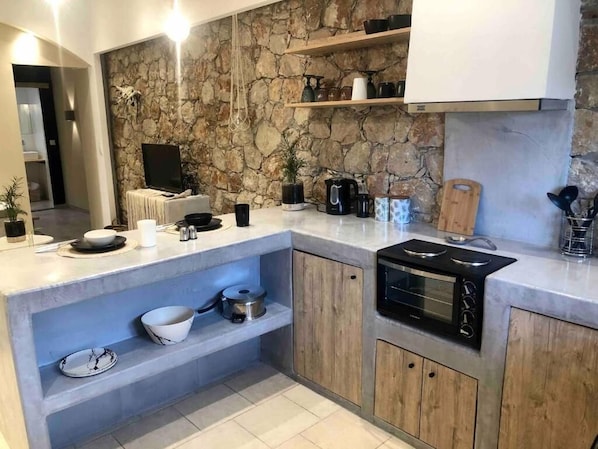 Fridge, oven, electric kettle, cookware/dishes/utensils