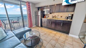 Fridge, microwave, stovetop, coffee/tea maker