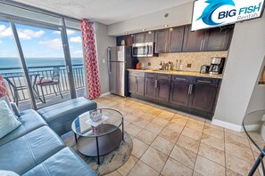 Fridge, microwave, stovetop, coffee/tea maker