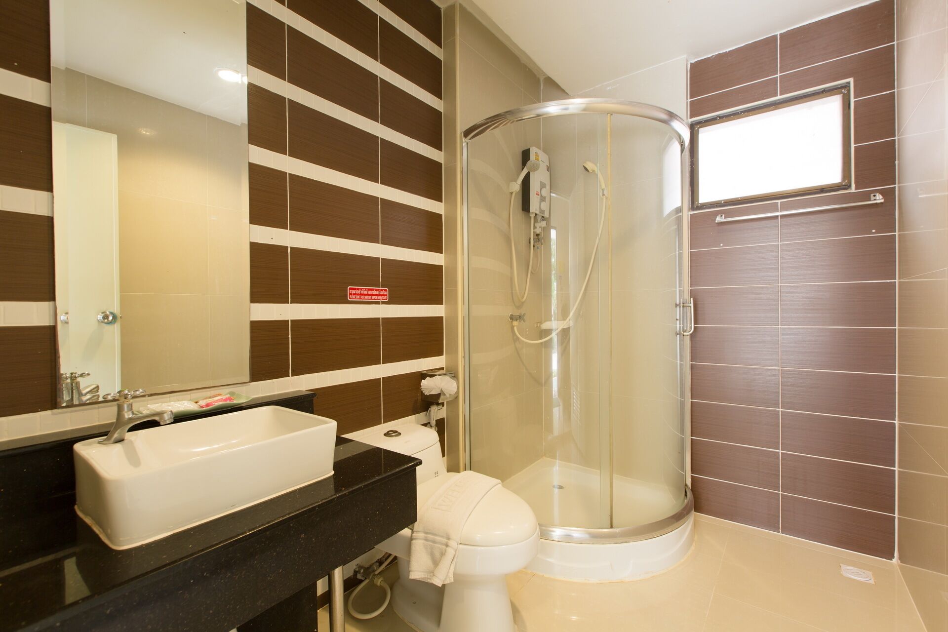 Shower, towels, soap, toilet paper