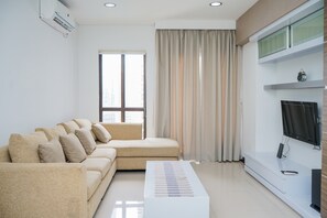 TV - Homey and Modern Tamansari Semanggi 2BR Apartment (Jakarta)