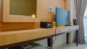 Television - Modern and Stylish Studio Apartment at Elpis Residence (Jakarta)