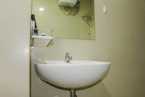 Shower, towels - Minimalist Studio Apartment at Atria Residences with Pool View (Gading Serpong)