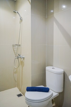 Shower, towels - Minimalist Pool View Low Rise Studio @ Paramount Skyline Apartment (Gading Serpong)
