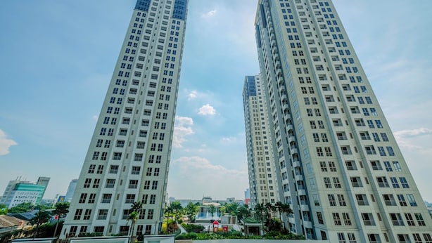 Two high-rise buildings with a clear sky. - Relax 3BR Apartment at M-Town Residence (Gading Serpong)