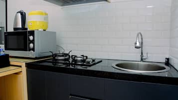 Fridge, stovetop, cookware/dishes/utensils