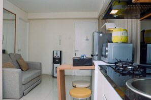 TV - Elegant and Comfy 2BR above Mall at Bassura City Apartment (Jakarta)