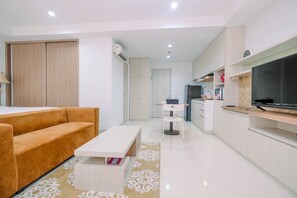 Room | Free WiFi, bed sheets - Spacious and Comfy Studio at Azalea Suites Cikarang Apartment (Cikarang)