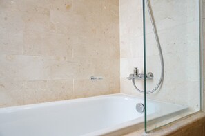 Room | Deep-soaking bathtub - Elegant 2BR at The Empyreal Condominium Epicentrum Apartment (Jakarta)