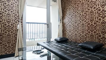 Habitación | Área de sala de estar | Televisión