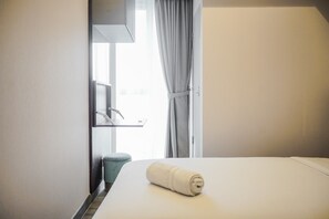 Room | 2 bedrooms, free WiFi, bed sheets - Lavish and Pleasant 2BR Apartment at The Branz BSD (Pagedangan)