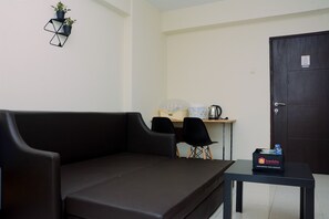 Room | Living area | TV - Minimalist and Cozy 2BR Apartment at Casablanca East Residence (Jakarta)