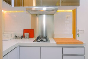 Private kitchen - Modern Studio at Titanium Square Apartment (Jakarta)