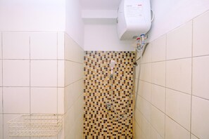 Habitación | Baño | Regadera y toallas 