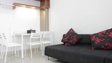 Quarto | Área de estar | TV