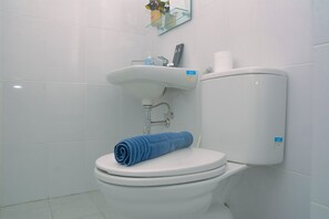 Room | Bathroom - Cozy and Minimalist Studio Patraland Urbano Apartment near Bekasi Station (Bekasi)