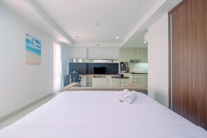 Free WiFi, bed sheets - Stunning Studio Azalea Suites Apartment (Cikarang)