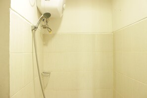 Room | Bathroom shower - Comfortable Studio Room Apartment at Stanford Jatinangor (Cileunyi)