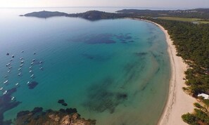 On the beach, sun-loungers