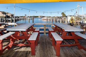 Dine with a view of the marina and water from our waterfront dining area.
