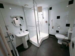 Shower, hair dryer, towels, soap