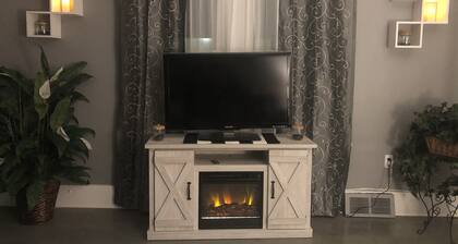 Luxury Cali King Suite · Smart TVs & Wireless Charging in Every Room