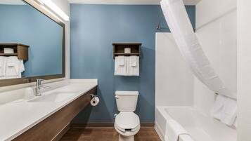 Combined shower/bathtub, towels, soap, toilet paper